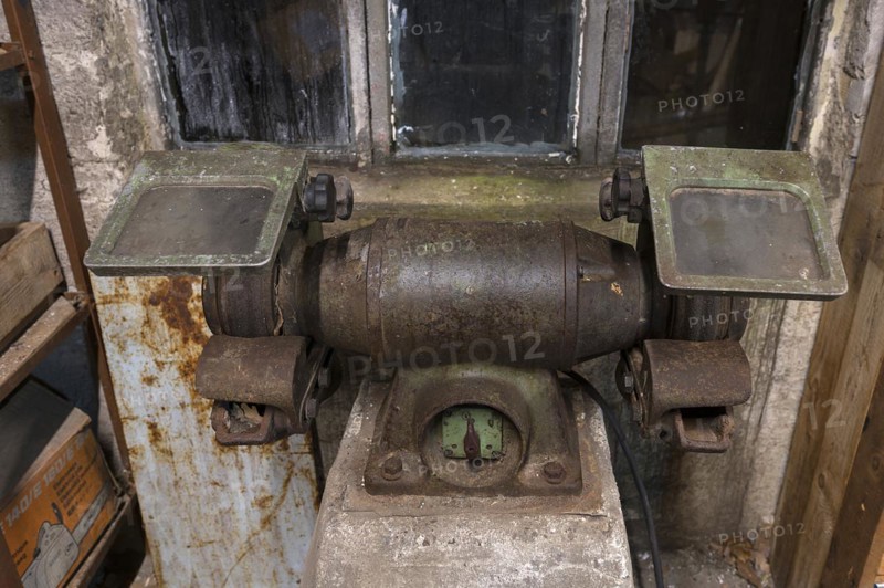 Old grinding machine in a former LPG workshop in the GDR, Mecklenburg-Vorpommern, Germany, Europe