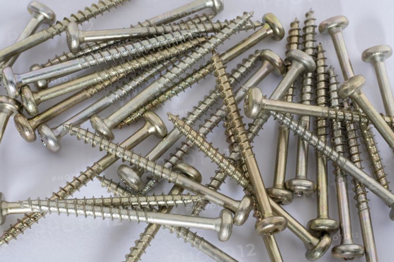 Phillips screws on a white background, wood screws