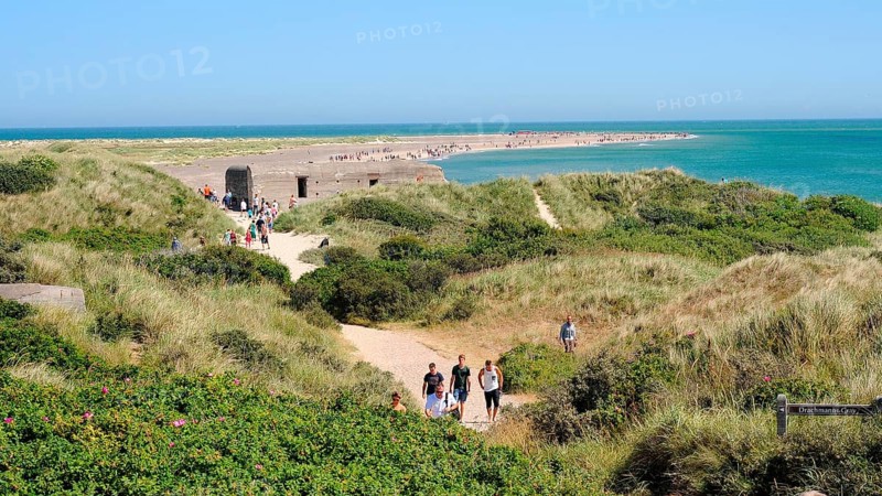 Tourists walk among sand dunes on Grenen, Skagen, Jutland, Denmark, Scandinav, Europe