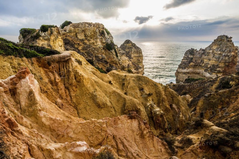 Rocky coast and red rocks, Praia do Camilo, Lagos, Algarve, Portugal, Europe
