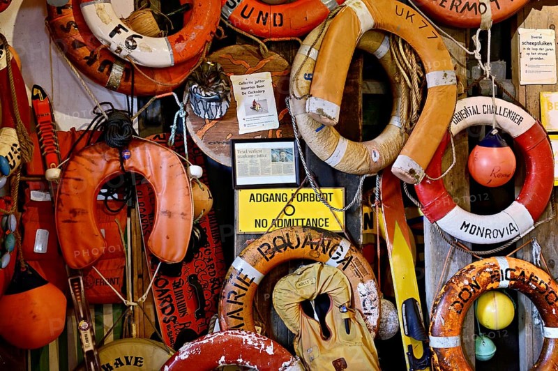 Lifebuoys and lifejackets fished out of the sea by beachcombers, Maritime and Beachcomber Museum Flora, the world's largest beachcomber museum, De Koog, Holland, Netherlands