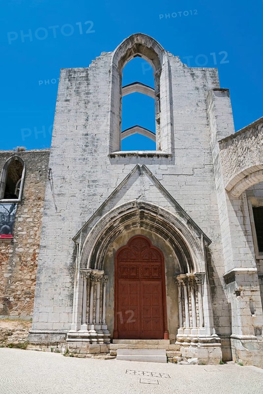 A Gothic church ruin with ornate archways standing out against the clear blue sky, Convento do Carmo, Do Carmo Monastery, Lisbon, Lisboa, Portugal, Europe