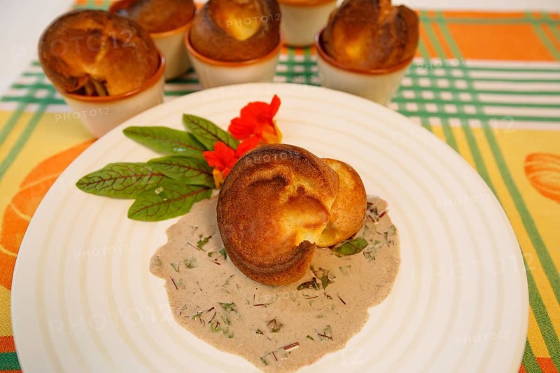 Swabian cuisine, Pfitzauf with sorrel sauce, vegetarian, baked, served on a plate, grandmother's cooking, regional, home cooking, typical Swabian, traditional cuisine reinterpreted, food photography, studio, Germany, Europe