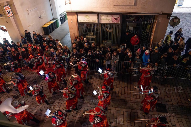 Bird's eye view of a band and numerous spectators on the street, carnival, Calw, Black Forest, district of Calw, Germany, Europe