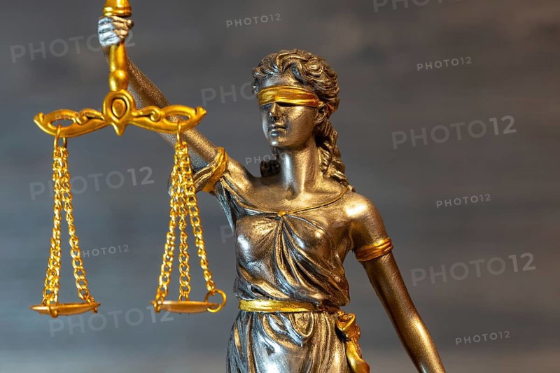 Close-up of a Justitia as a symbol of court judgements, jurisdiction, justice, etc