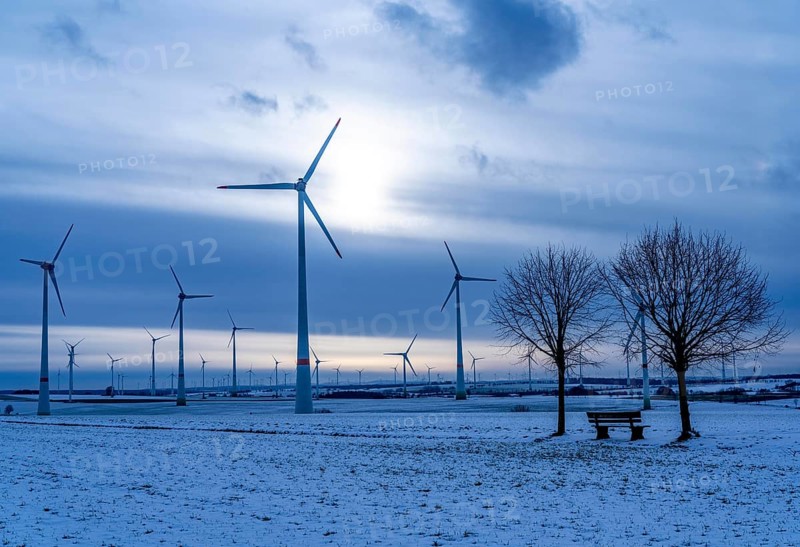 Wind farm, north of Lichtenau, self-proclaimed energy town, over 190 wind turbines and over 1200 solar panels generate 10 times as much electricity as the community of 11, 900 inhabitants consumes, largest onshore cluster of wind turbines in Germany, winter, slightly snow-covered landscape, North Rhine-Westphalia, Germany, Europe