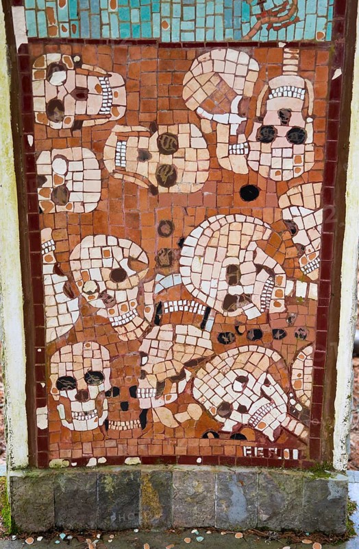 Artistic mosaic with skulls in brown colours and square patterns, Jama pod Krenom, remembrance of the mass murders of World War II, forest near Kocevje, Kocevje, Gottschee, historical landscape of Lower Carniola, south-eastern Slovenia, Slovenia, Europe