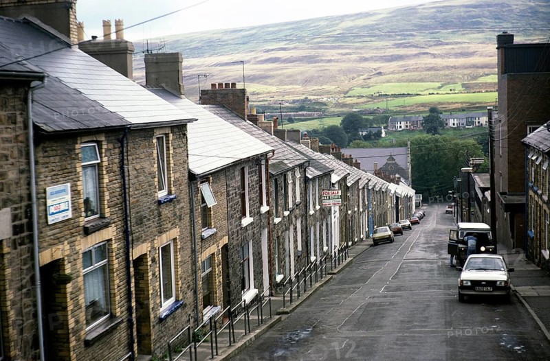 Steeply sloping street with Victorian terraced houses, Park Street, Blaenavon, Torfaen, South Wales UK 1987