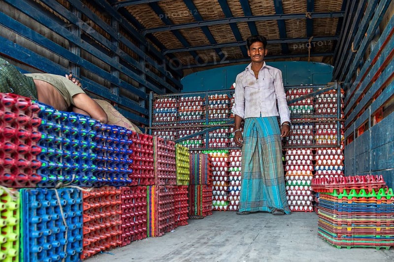 Man, egg seller, lorry with egg cartons, Rameswaram or Rameshwaram, Pamban Island, Tamil Nadu, India, Asia