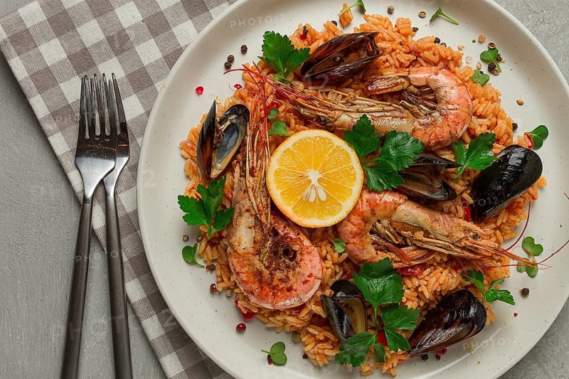 Seafood paella, shrimp and mussels risotto, rice, homemade, top view, no people