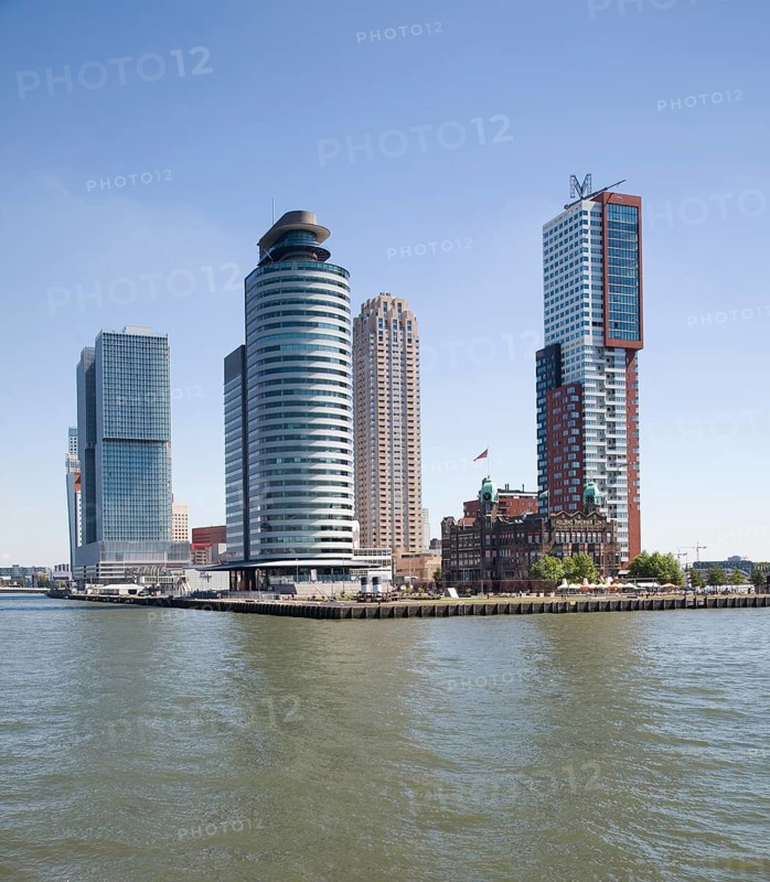 Historic Hotel New York building dwarfed by modern skyscrapers, Rotterdam, Netherlands