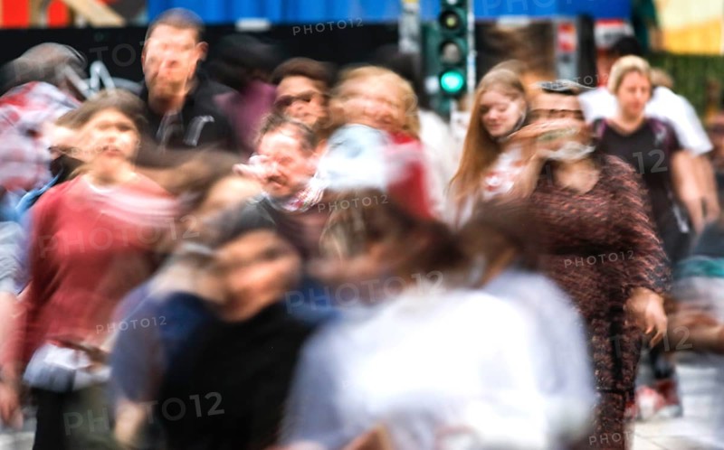Dense crowds around Alexanderplatz. People with masks. Difficult to keep the distance rule. Don't get infected. Germany is slowly opening up again. Shops, cafés, restaurants, shopping centres are now allowed to reopen, Berlin, 22.05.2020
