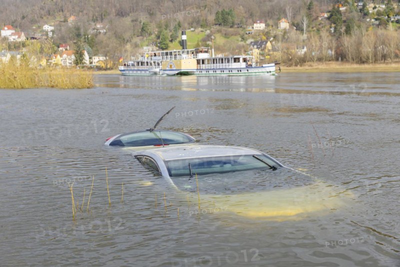 Recently, an inadequately secured car sank in the flood waters of the Elbe and was only located after an extensive search. The salvage is still pending. The Elbe steamer Meissen passes the scene of the accident, Dresden, Saxony, Germany, Europe