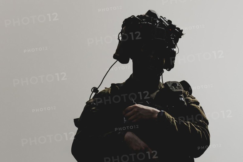 Armed soldier with sensor technology for training purposes, photographed as part of a Bundeswehr exercise with armed forces from Norway and the Czech Republic during the 'Wettiner Schwert' exercise as part of Quadriga 2024 in the training town of Schnöggersburg, 8 April 2024