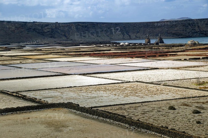 Sea salt extraction, Janubio salt flats, Salinas de Janubio, Lanzarote, Canary Islands, Canary Islands, Spain, Europe