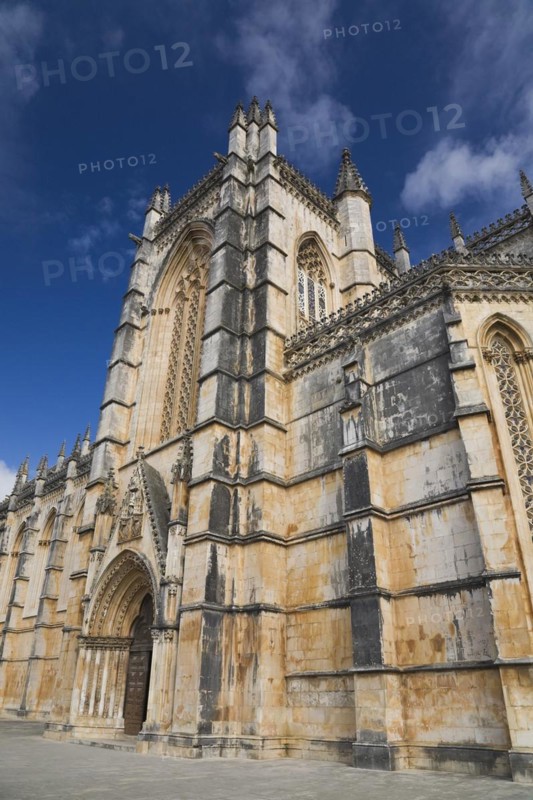 14th century built Santa Maria da Vitoria Monastery with arched entrance door, Batalha, Portugal, Europe