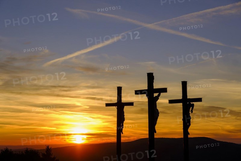 Sunset, crucifixion group, three crosses on the Kreuzberg in the Rhön, Kreuzberg near Bischofsheim, Rhön, Lower Franconia, Bavaria, Germany, Europe