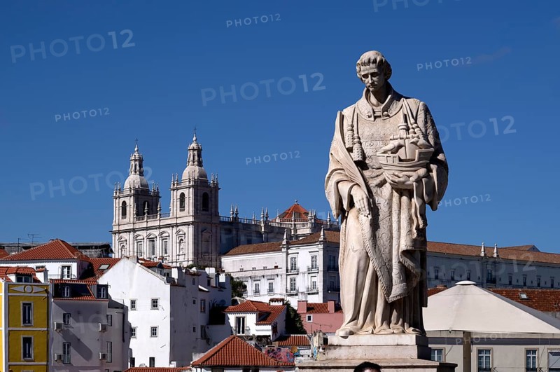 View from the viewpoint Miradouro de Santa Luzia, São Vicente statue, church Igreja de Santo Estêvão, city view, Alfama, Lisbon, Portugal, Europe