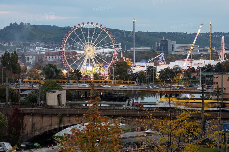 Stuttgarter Volksfest, Cannstatter Wasen Stuttgart 2024 Baden-Württemberg, Germany. In the background the Rotenberg with the burial chapel on the Württemberg and the Swabian car manufacturer with the star