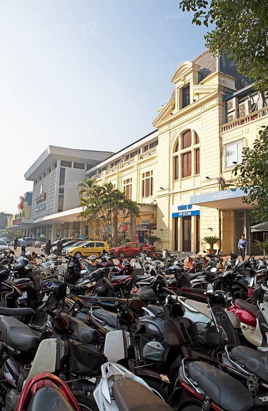 Mopeds at Hanoi railway station, Vietnam, Asia