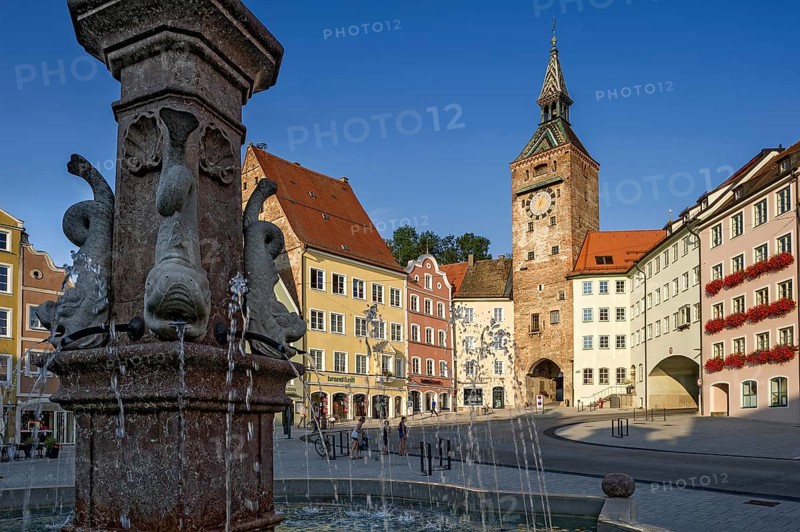 Medieval gate tower, Schmalzturm town gate or beautiful tower, baroque sculptures as gargoyles, dolphins at the Marienbrunnen fountain, main square, old town, Landsberg am Lech, Upper Bavaria, Bavaria, Germany, Europe