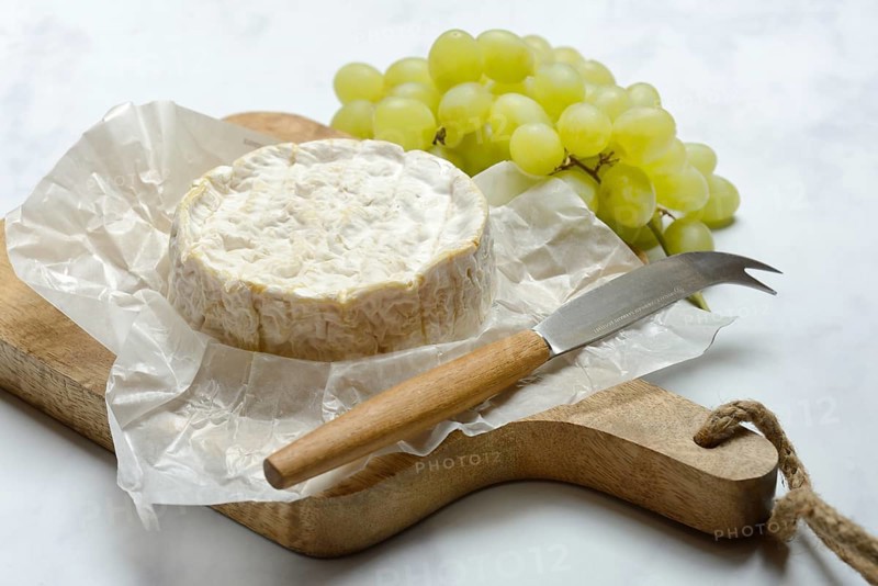 French Camembert, cheese on a wooden board