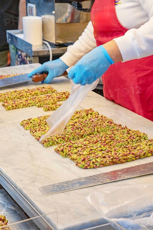 Person making traditional nougat, Ortygia, Syracuse, Sicily, Italy, Europe