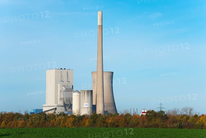 Industrial plant with chimney and cooling tower in autumn landscape under blue sky, Mehrum coal-fired power station, Peine district, Lower Saxony, Germany, Europe