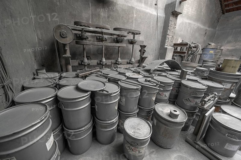 Metal barrels covered with zinc dust in the filling room for zinc powder of a metal powder mill, founded in 1900, Igensdorf, Upper Franconia, Bavaria, Germany, Europe