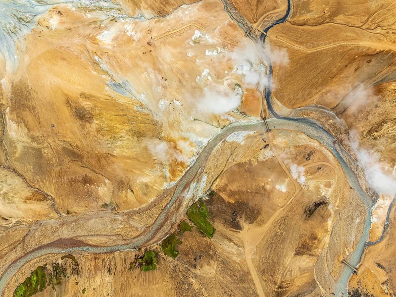 Steaming hot springs and colourful rhyolite mountains, aerial view, Hveradalir geothermal area, Kerlingarfjöll, Icelandic highlands, Iceland, Europe