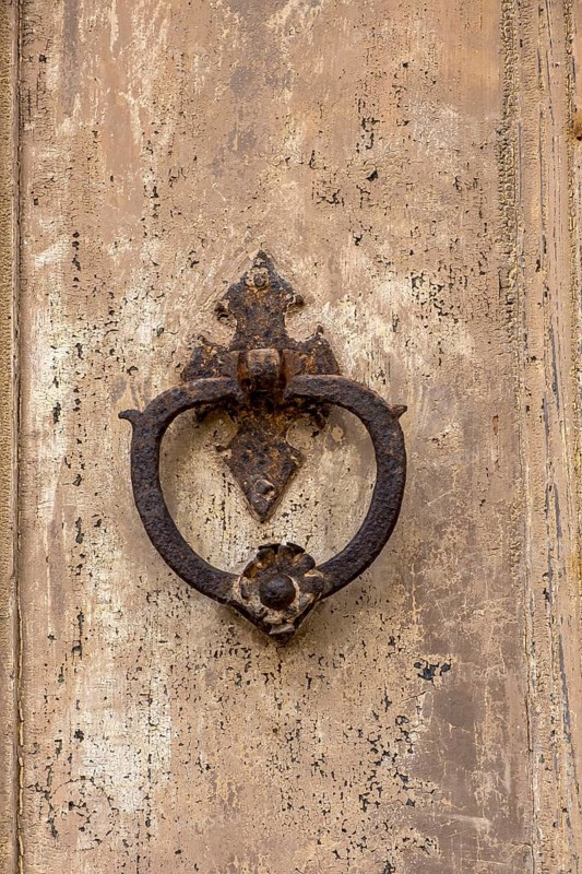 Door knocker on an old wooden gate, Galatina, Apulia, Italy, Europe