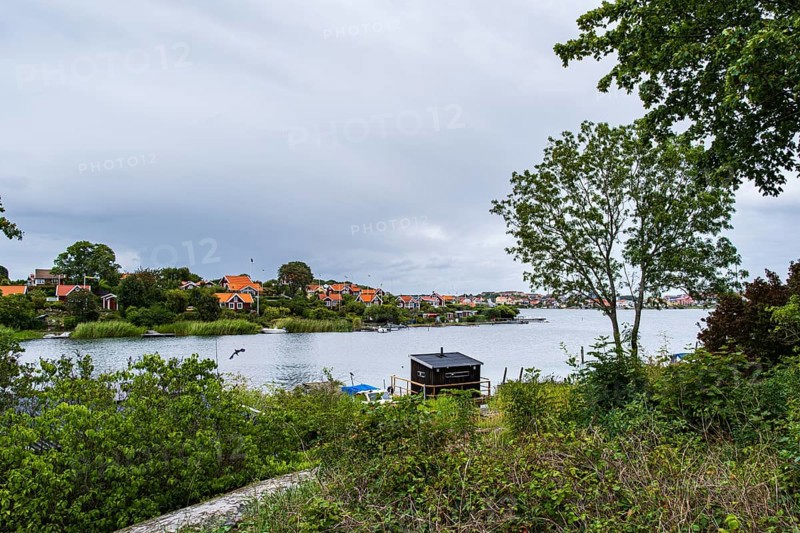 View from the island of Saltö to the famous allotment garden colony Brändaholm on the island of Dragsö in the archipelago of Karlskrona, Blekinge län, Sweden, one of Sweden's most common picture postcard motifs, Europe