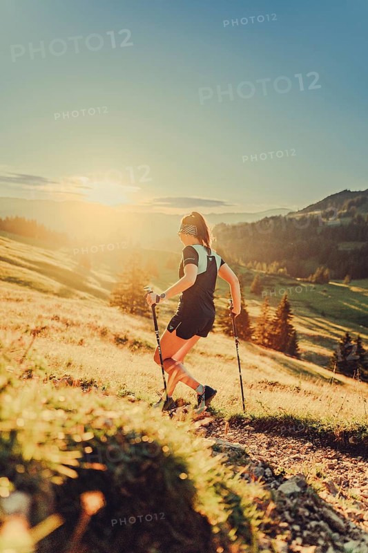 Summer trail running and hiking in the Alps on the Riedberg Pass between Obermaiselstein and Balderschwang in the Allgäu, Bavaria, Germany, Europe