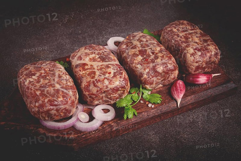 Raw apkhazura, a dish of Georgian cuisine, meat balls, minced meat wrapped in a fat net, seftalia, homemade, no people