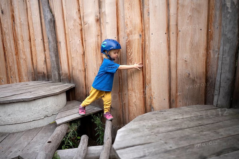 Little girl, 3 years, blonde, helmet, helmet, balancing, gymnastics, playing, adventure playground, playground, Stuttgart, Baden-Württemberg, Germany, Europe