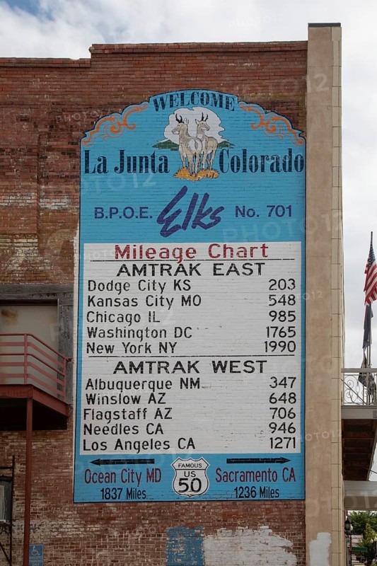 La Junta, Colorado, A chart on the outside of the Elks Lodge near the Amtrak station lists train mileage to destinations east and west