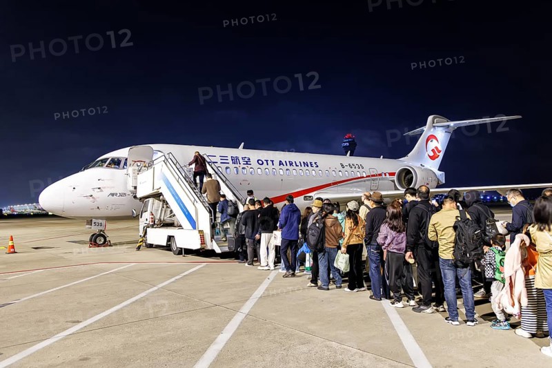 First Chinese designed and built aircraft COMAC ARJ21-700 of OTT Airlines with registration B-653S at Pudong Airport (PVG) in Shanghai, China, Asia