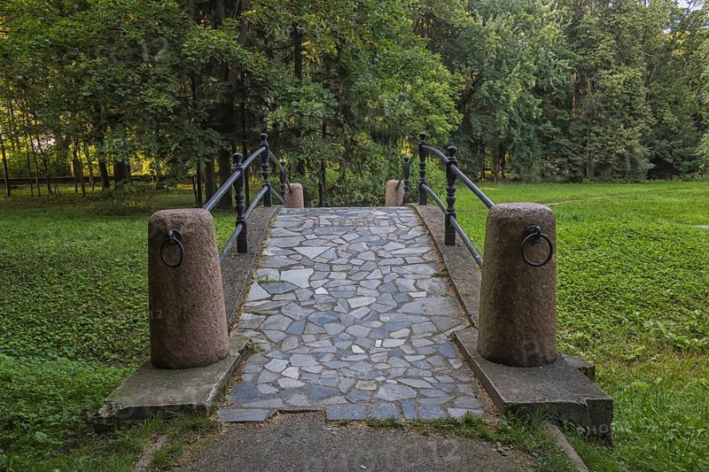 Old stone bridge in the park. Belarus