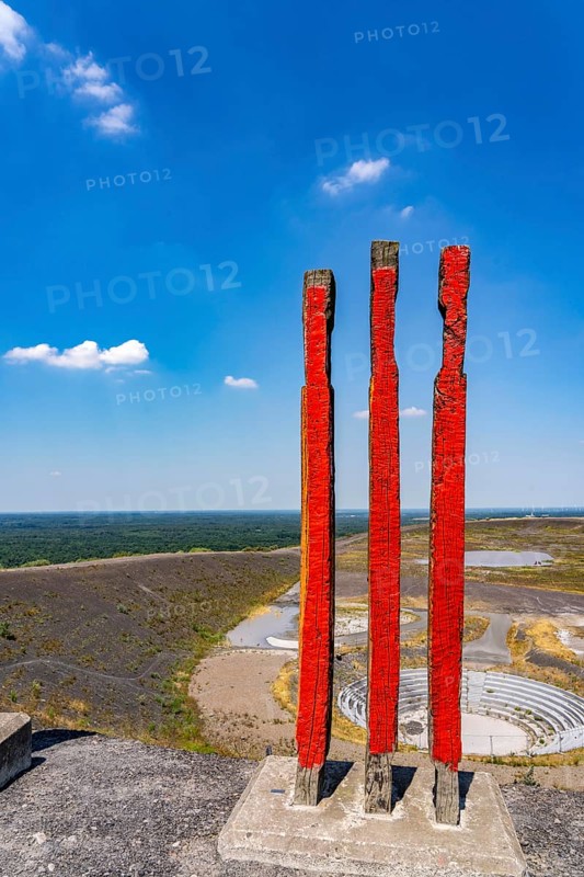 The Haniel spoil tip, 185 metre high spoil tip, at the Prosper Haniel mine, which was closed in 2019, artwork Totems by the sculptor Augustin Ibarrola, mountain arena, amphitheatre, Bottrop, Germany, Europe