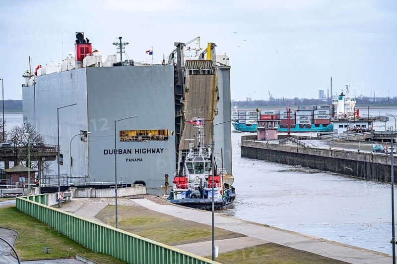 North lock in the overseas harbour of Bremerhaven, the vehicle transporter Durban Highway, under the flag of Panama, can load around 600 cars, leaves the harbour from the Bremerhaven car terminal, loaded with new cars, then heads for the Suez Canal, Bremen, Germany, Europe