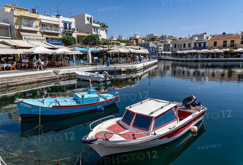 The village of Agios Nikolaos, in the eastern part of Crete, view over Lake Voulismeni, connected to the sea, old town, Greece, Europe