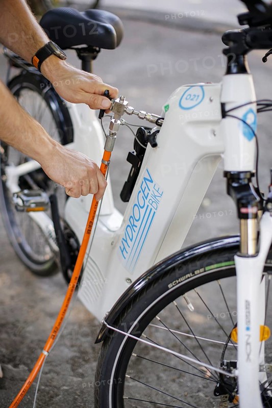 Pilot project for the production and application of green hydrogen (gH2) in the field of micromobility (cargo bikes) to save CO2. University of Rio de Janeiro. A bicycle is refuelled with hydrogen. Rio de Janeiro, 22.07.2024. Photographed on behalf of the Federal Ministry for Economic Cooperation and Development
