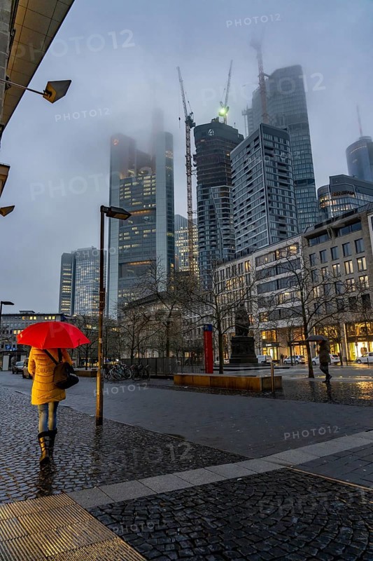 Rainy weather, freezing rain, Goetheplatz, high-rise skyline in clouds, passers-by hurrying through the damp, icy weather, Frankfurt am Main, Hesse, Germany, Europe