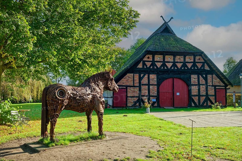 Art project Iron Valentina by Max Barske and farmhouse Strassen, open-air museum Klockenhagen, historical Mecklenburg village, Mecklenburg farmhouses, Klockenhagen, Mecklenburg-Vorpommern, Germany, Europe