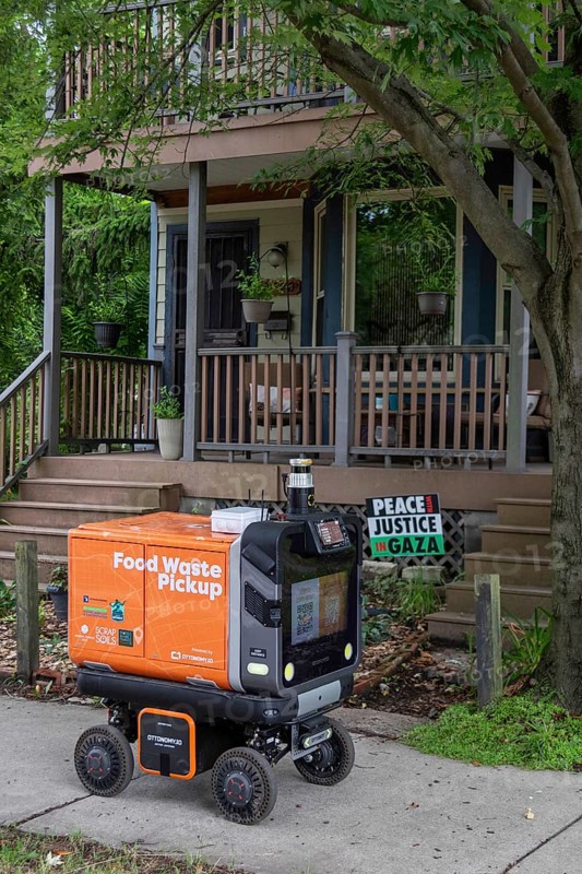 Detroit, Michigan, An experimental, autonomous robot travels the streets of Detroit's Corktown neighborhood, picking up food waste which it delivers to an urban farm for composting. The robot is operated by a nonprofit called Scrap Soils. It hopes the robot will increase interest in composting while reducing the greenhouse gases required by using a truck for the pickups