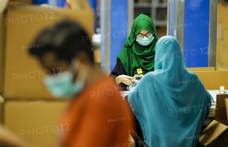 Employees of Inter Market Knit Private Limited producing socks. Lahore, 22.08.2024. Photographed on behalf of the Federal Ministry for Economic Cooperation and Development