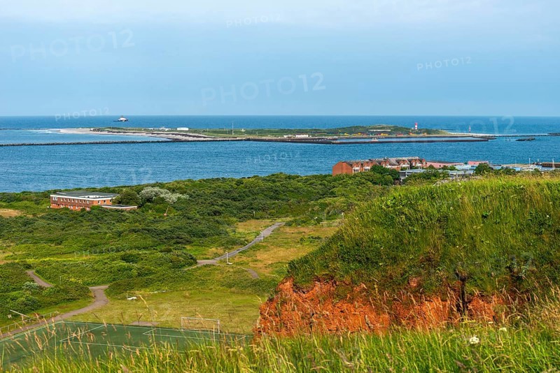 Dune of the high sea island Helgoland, view from the Helgoländer Oberland, dunes south beach with lighthouse, coloured sandstone, football field, North Sea, district Pinneberg, Schleswig-Holstein, Germany, Europe