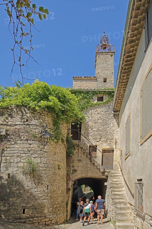 Tour de l'Horloge, clock tower and town gate with bell cage, town tower, tourists, Vaison-la-Romaine, Vaucluse, Provence, France, Europe