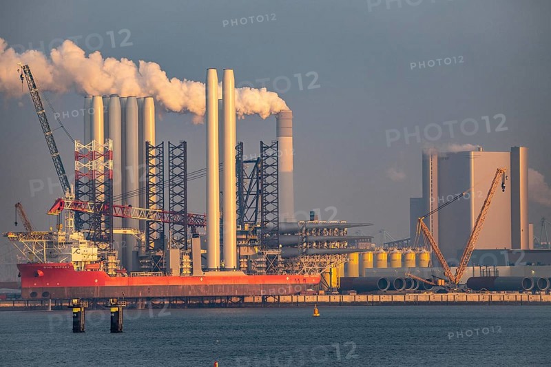 SIF Offshore Foundaitons, production of foundations for offshore wind turbines, the wind turbines are mounted on these pipes, which are installed in the seabed at water depths of up to 60 metres, production plant in the seaport of Rotterdam, Maasvlakte 2, behind the UNIPER coal-fired power plant, Rotterdam Netherlands