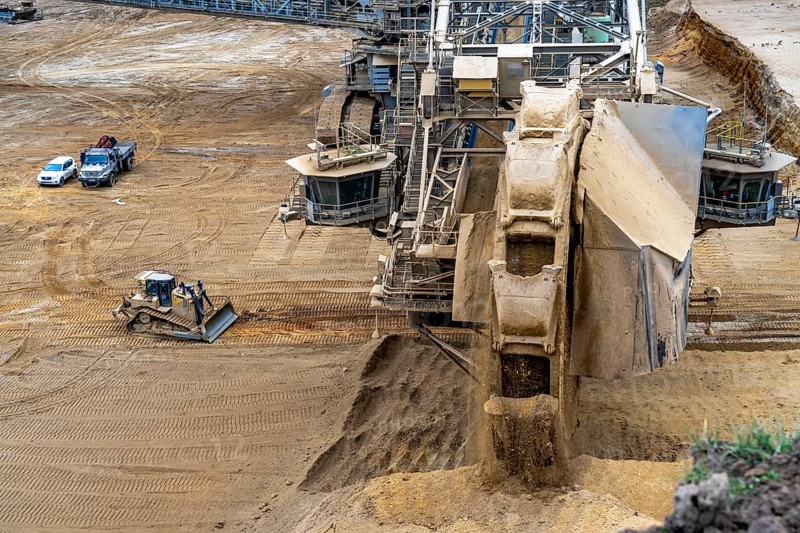 Opencast lignite mine Garzweiler 2, bucket wheel excavator 261 excavating the surface, at the rest of the hamlet Lützerath, bucket diameter is 17 metres, Erkelenz, North Rhine-Westphalia, Germany, Europe